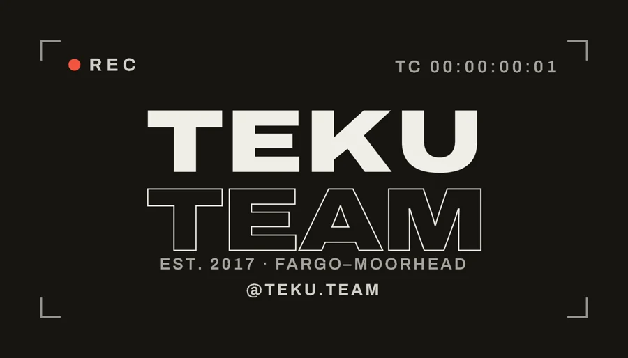 Teku Team business card front: a camcorder-viewfinder frame with a REC dot, timecode and corner brackets around the wordmark.